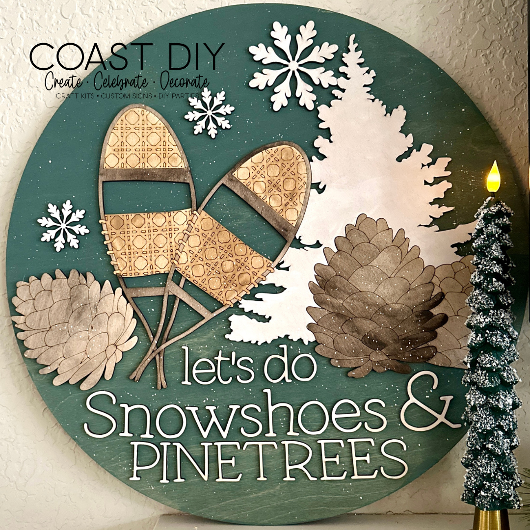 Snowshoes and Pinecones Doorhanger