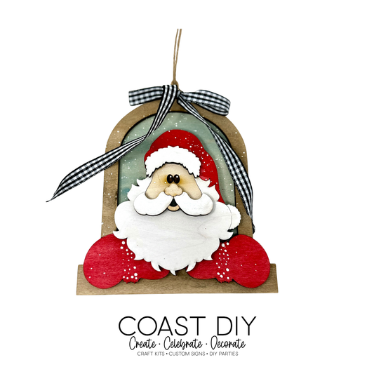 Santa leaning out window ornament